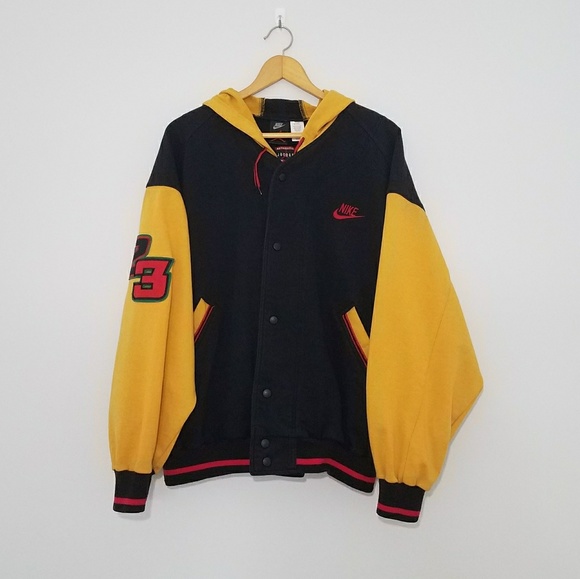 nike black and yellow jacket